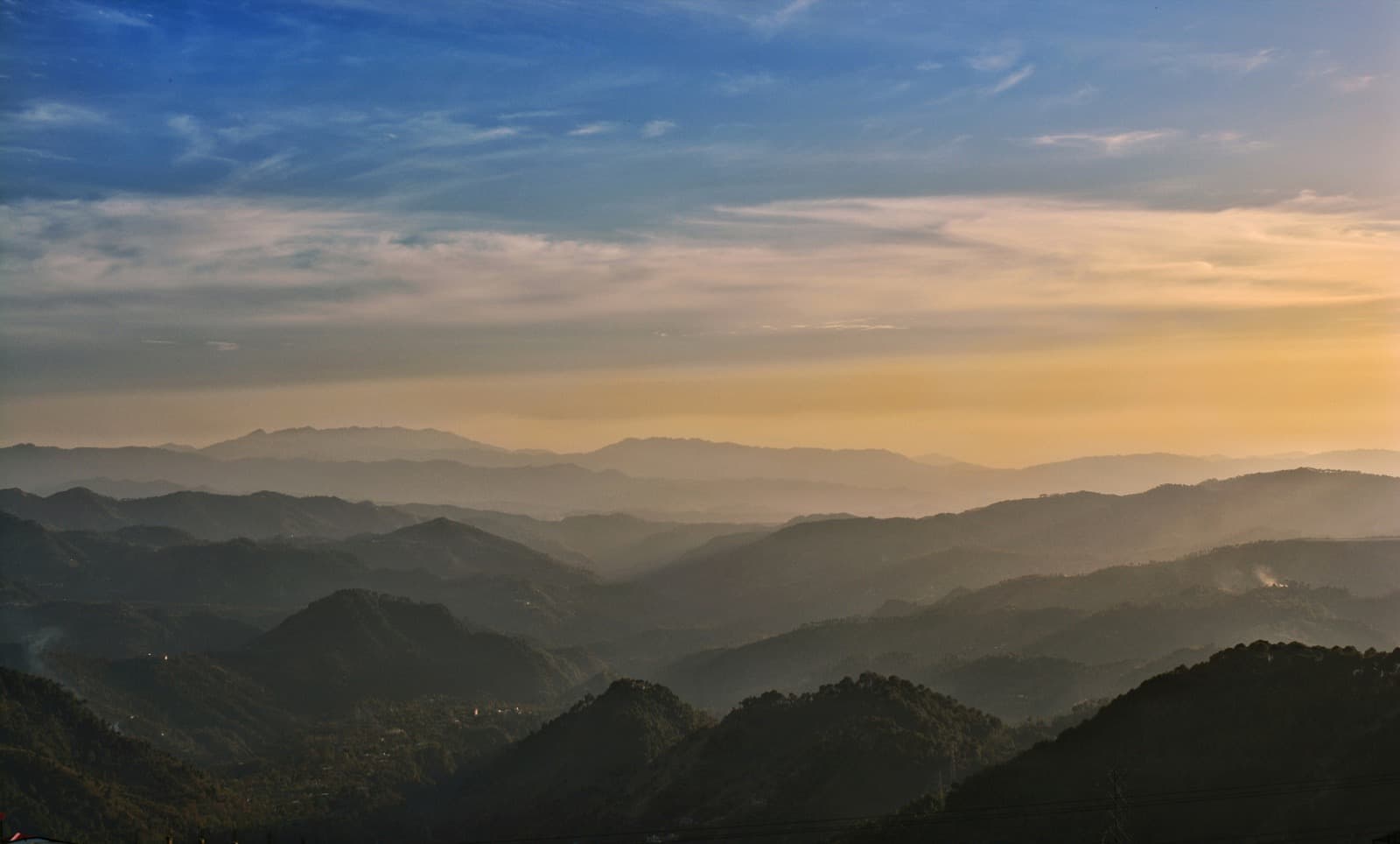Layered hills outside Solan at sunset
